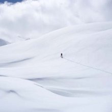 Lone ski-tourer (Henri Nogue)
