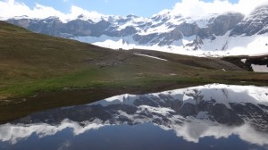 La Munia reflections in the cirque de troumouse, Pyrenees walking holidays